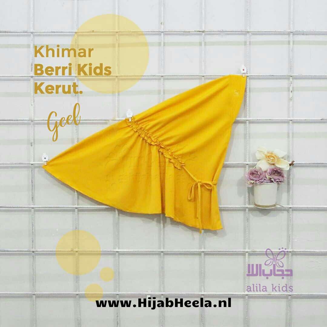 a yellow umbrella sitting on top of a wall