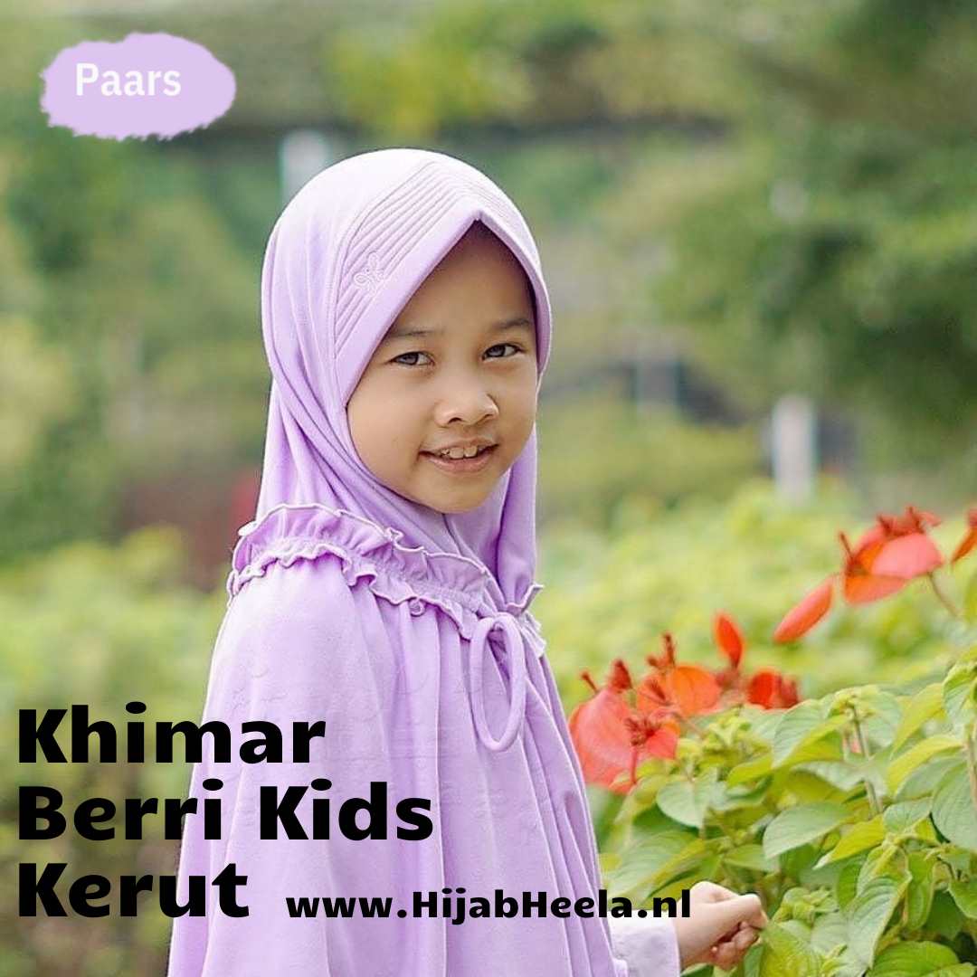 a young girl in a pink dress is in the grass