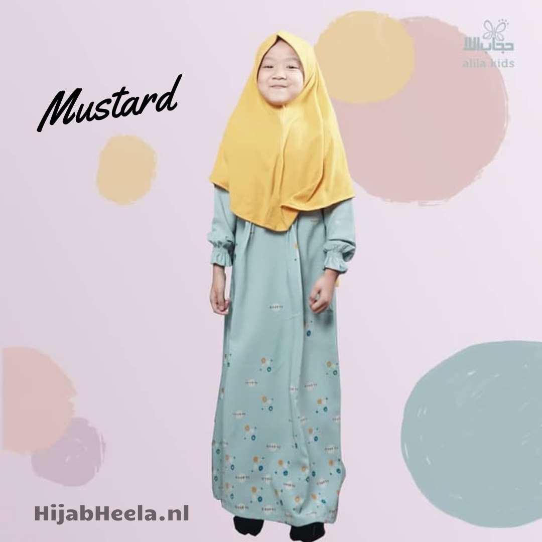 a woman in a yellow jacket holding a snowboard