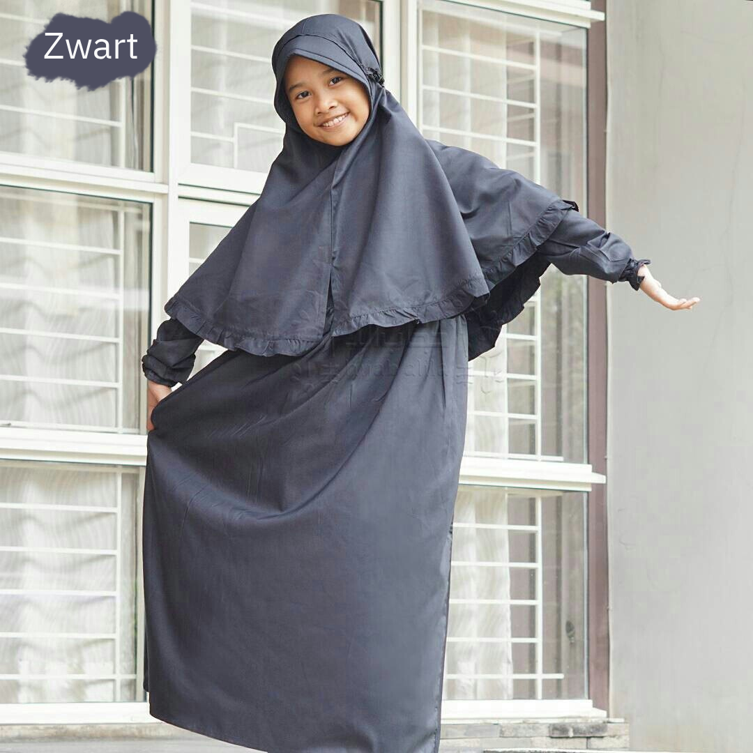 a woman standing in front of a building