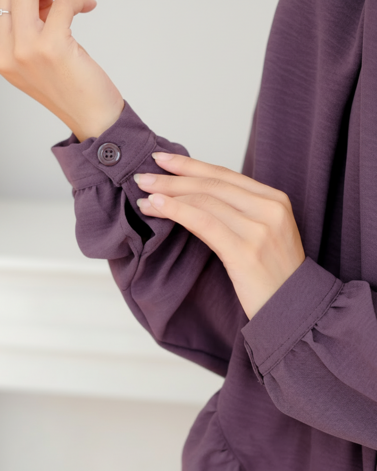 Abaya detail mouw knoop